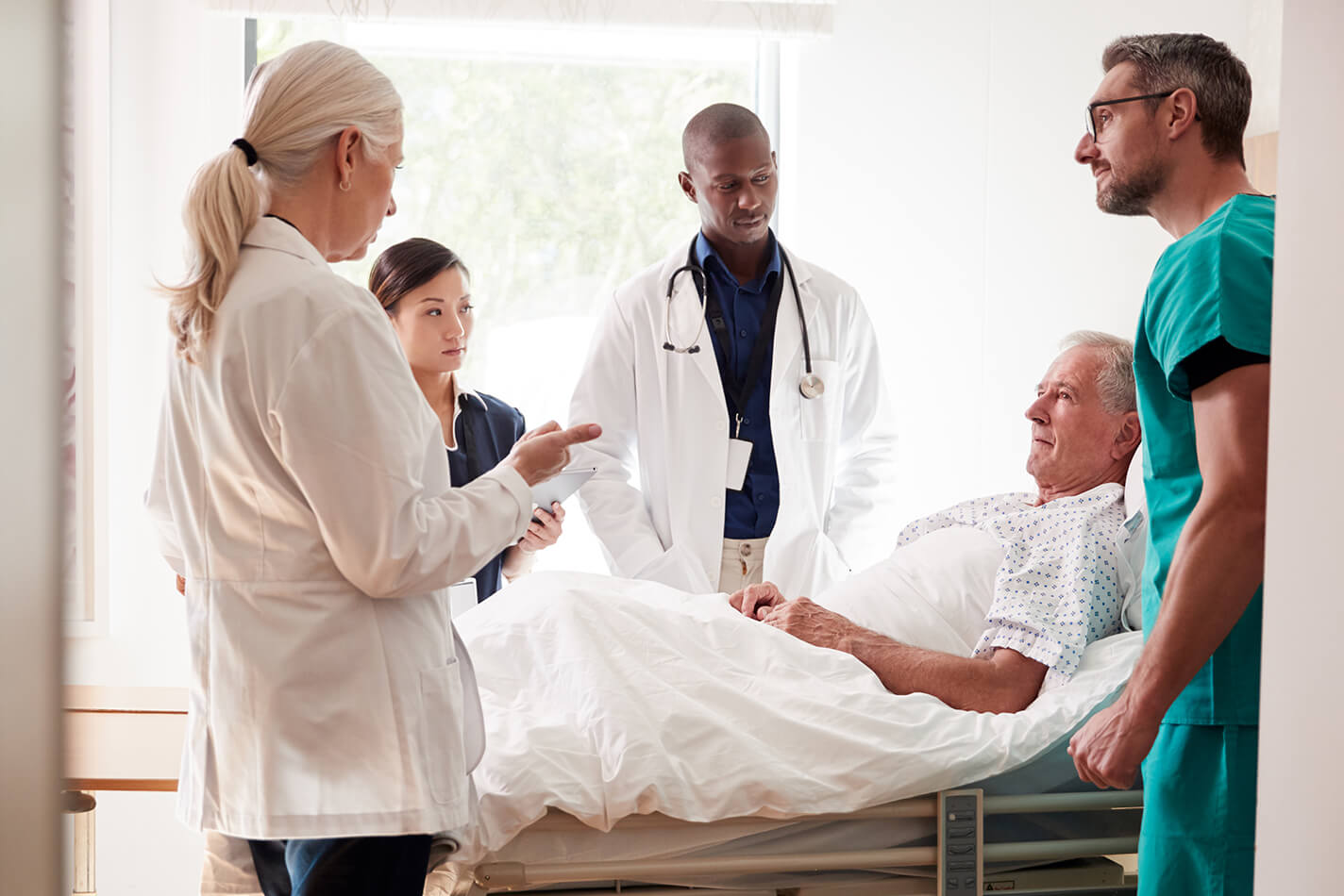 Doctor checking patient's vitals