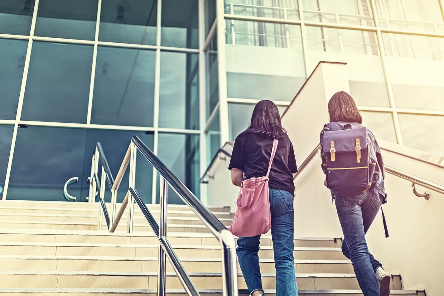 Students walking up steps