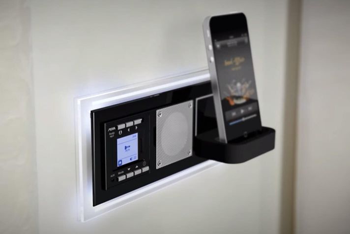 Wall mounted mobile music player
