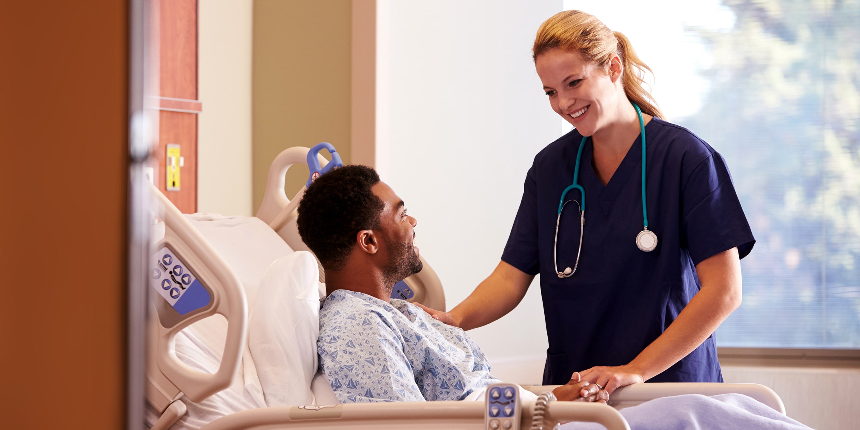 Satisfied Patient and Provider in Hospital Room