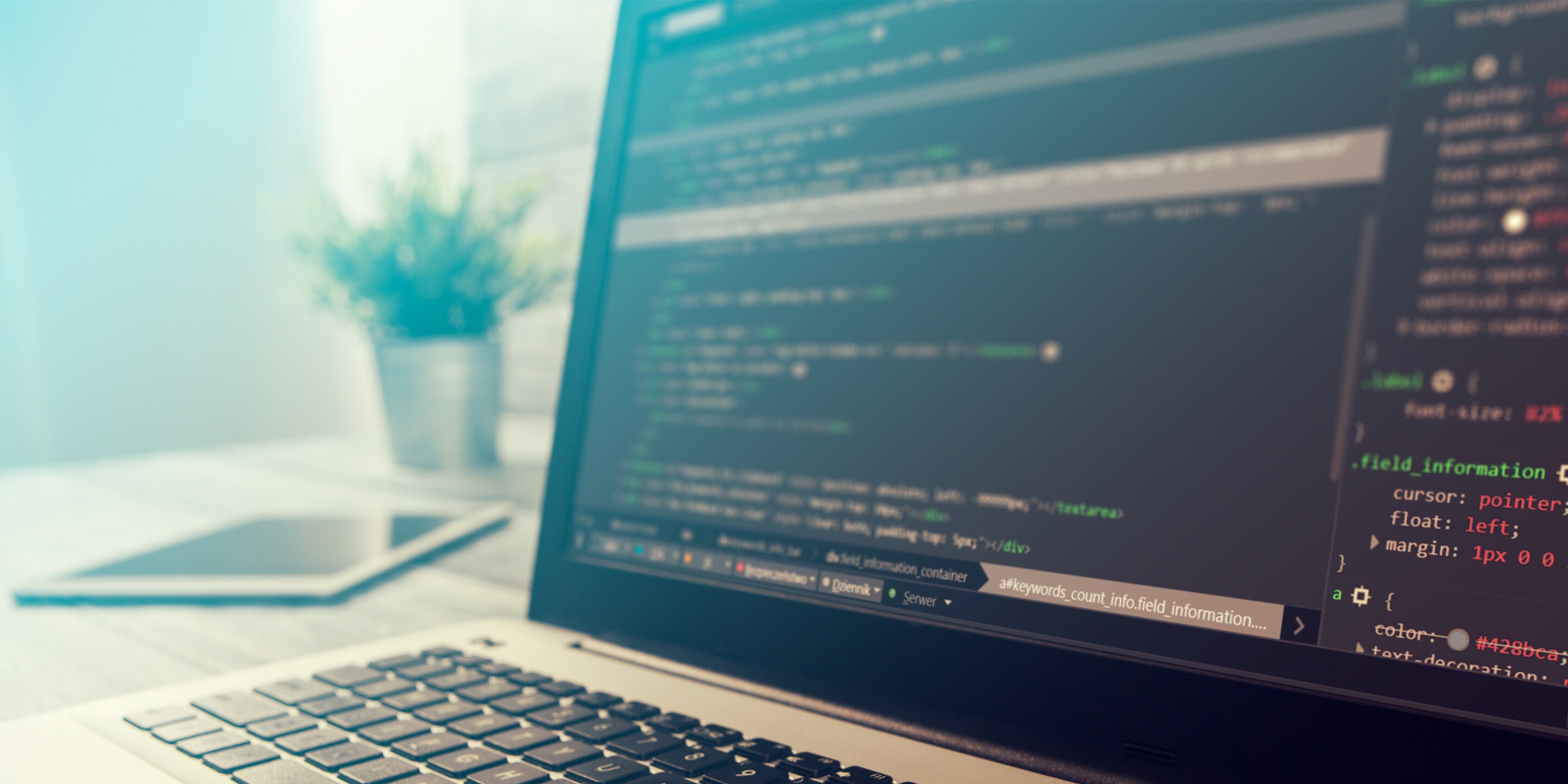 Laptop displaying code