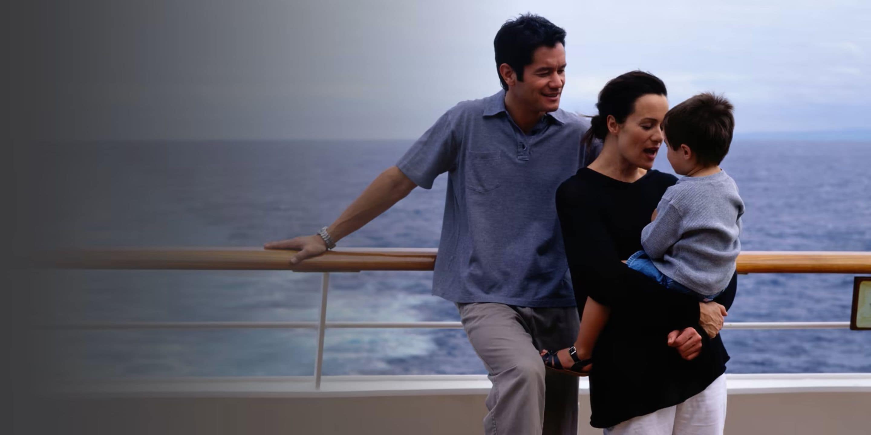 Family relaxing cruise ship couple with child
