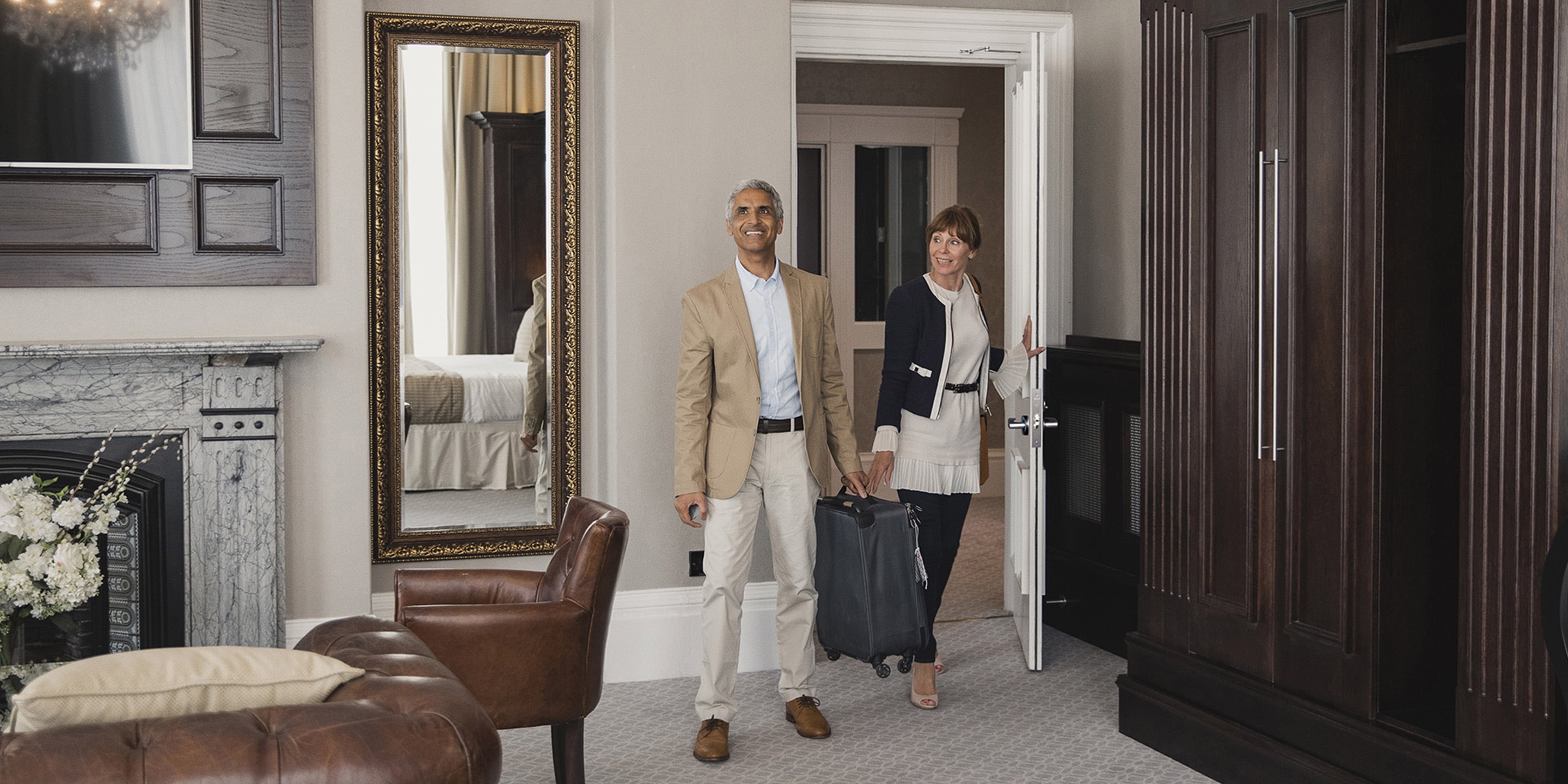 Serene lock couple entering hotel room