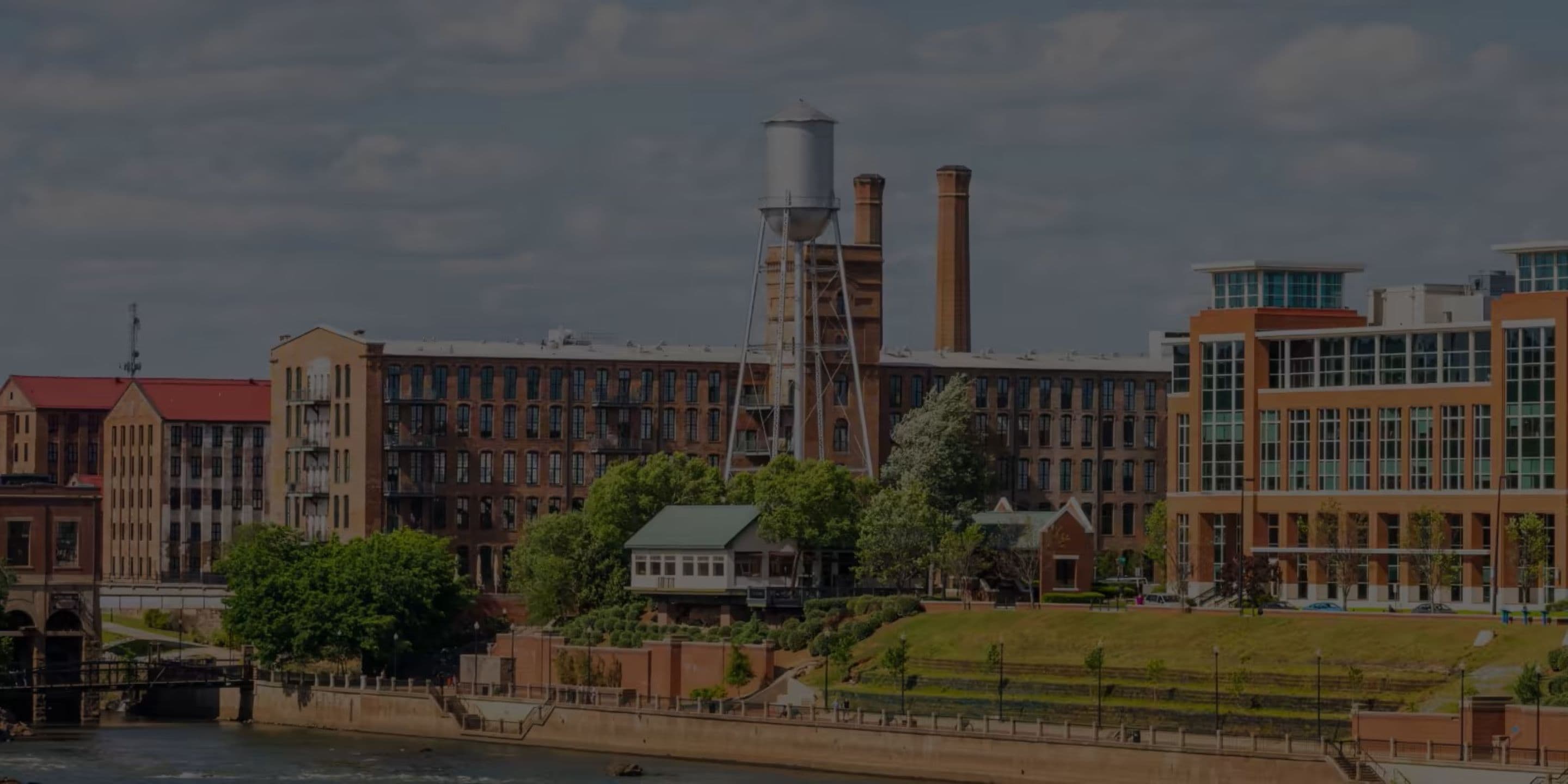 Supra industrial city skyline next to water