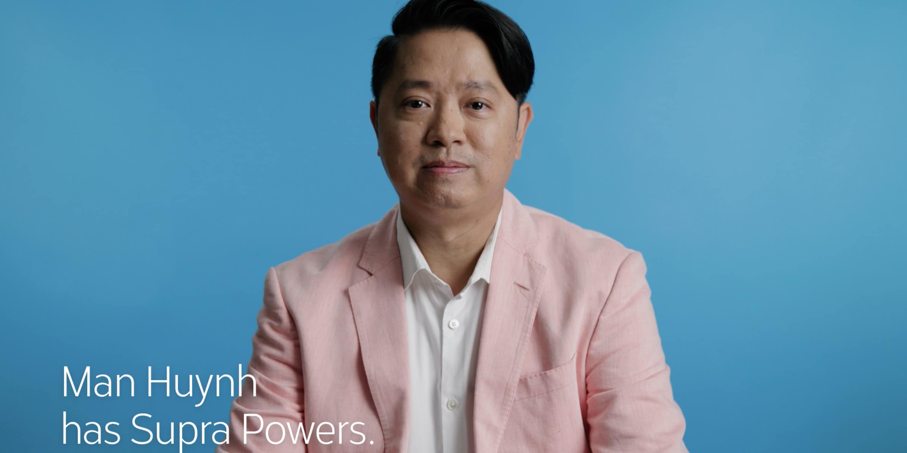 Close up of Asian American real estate agent Man Huynh with video caption