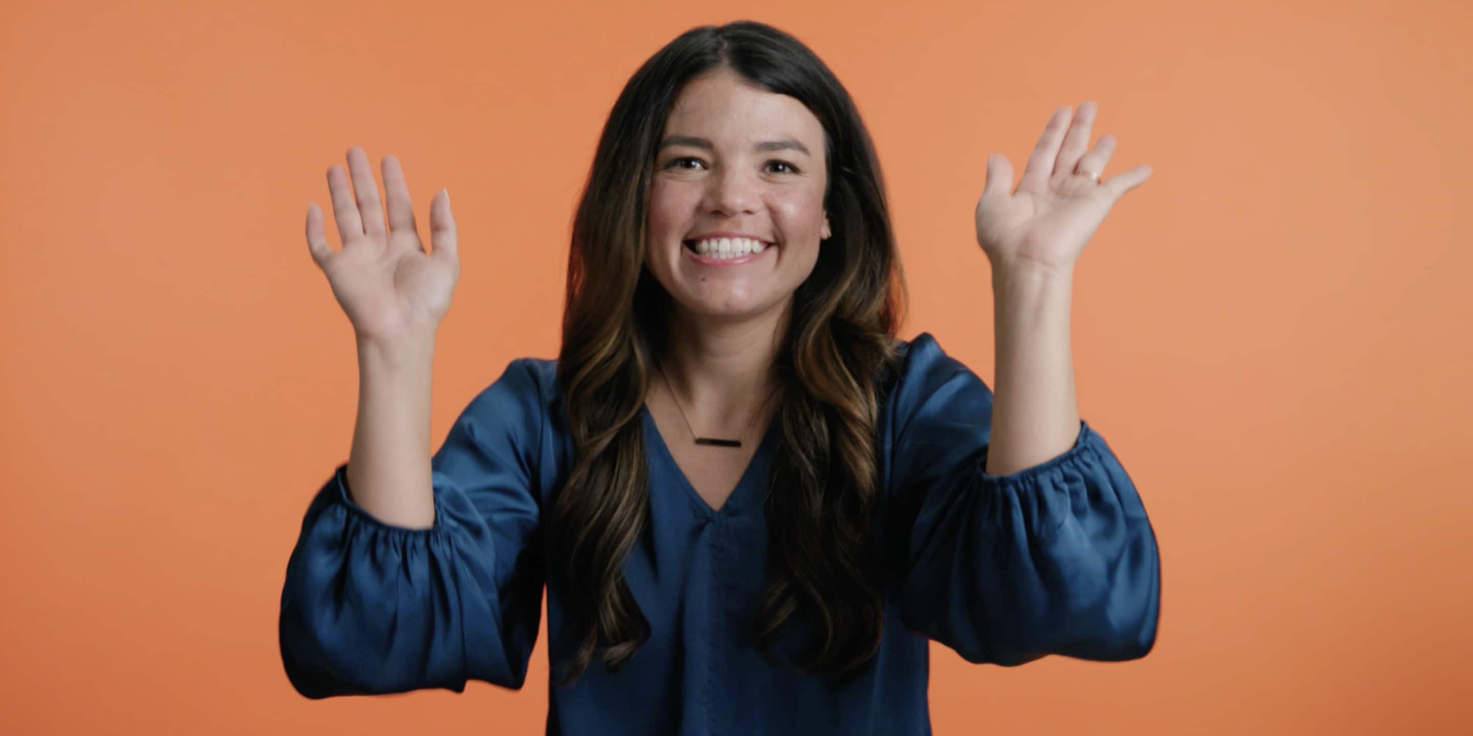 Real Estate Agent Felicia Mares Smiling Arms Up