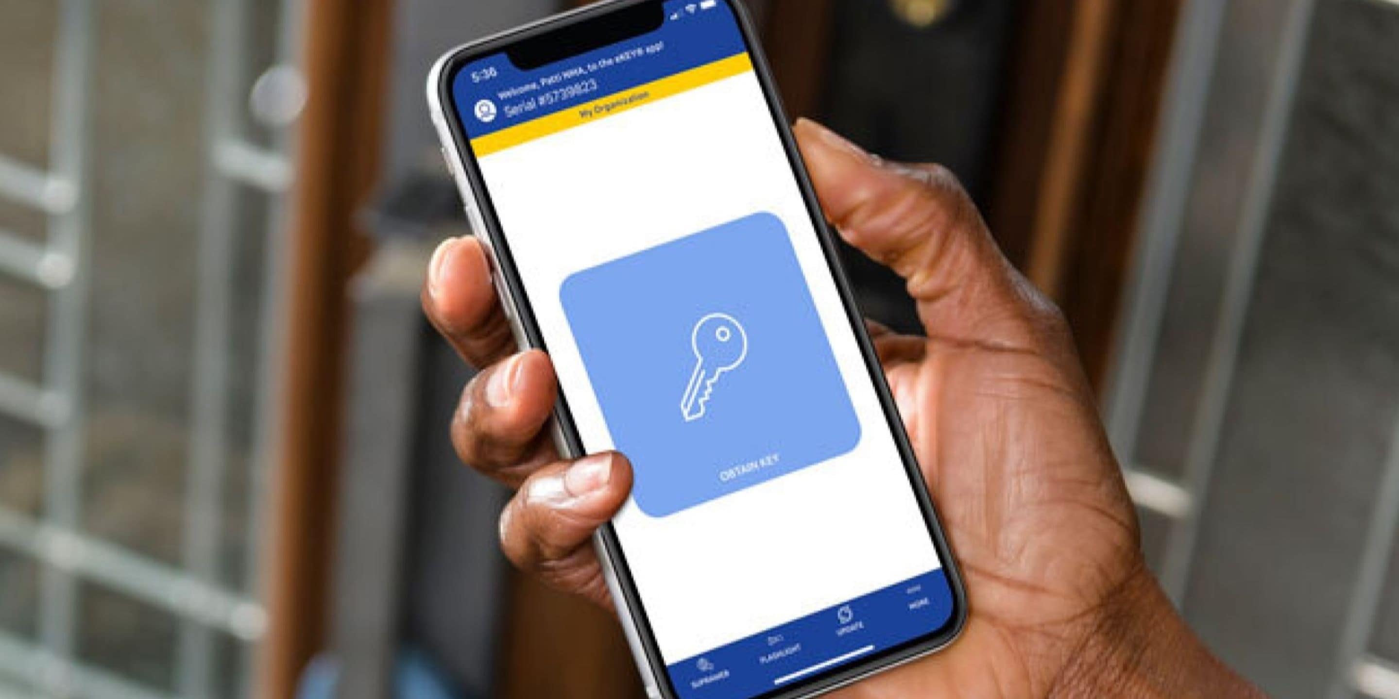 Supra eKEY app with large obtain key button for managed access on mobile phone.