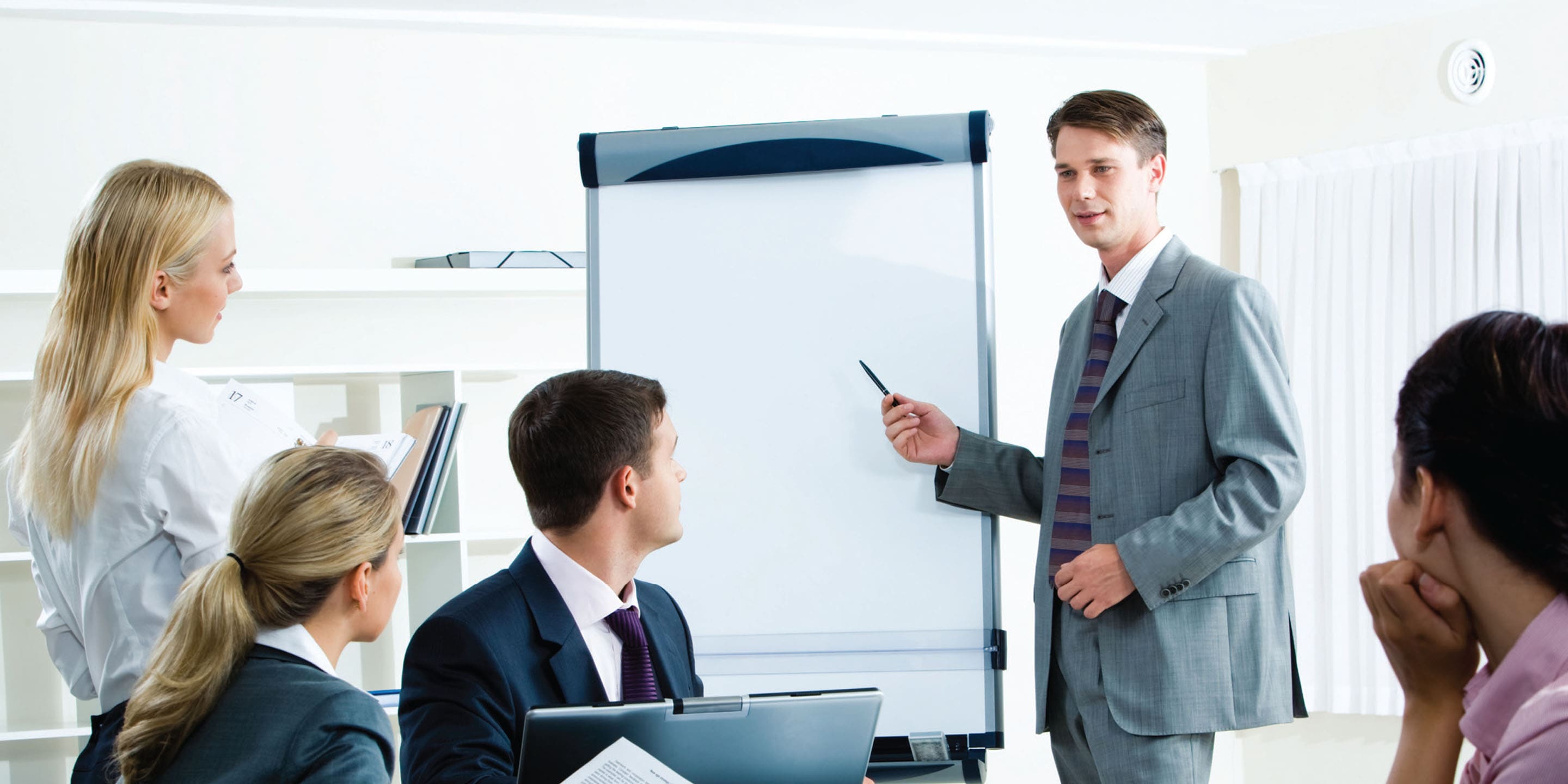 Professional giving presentation to other professionals