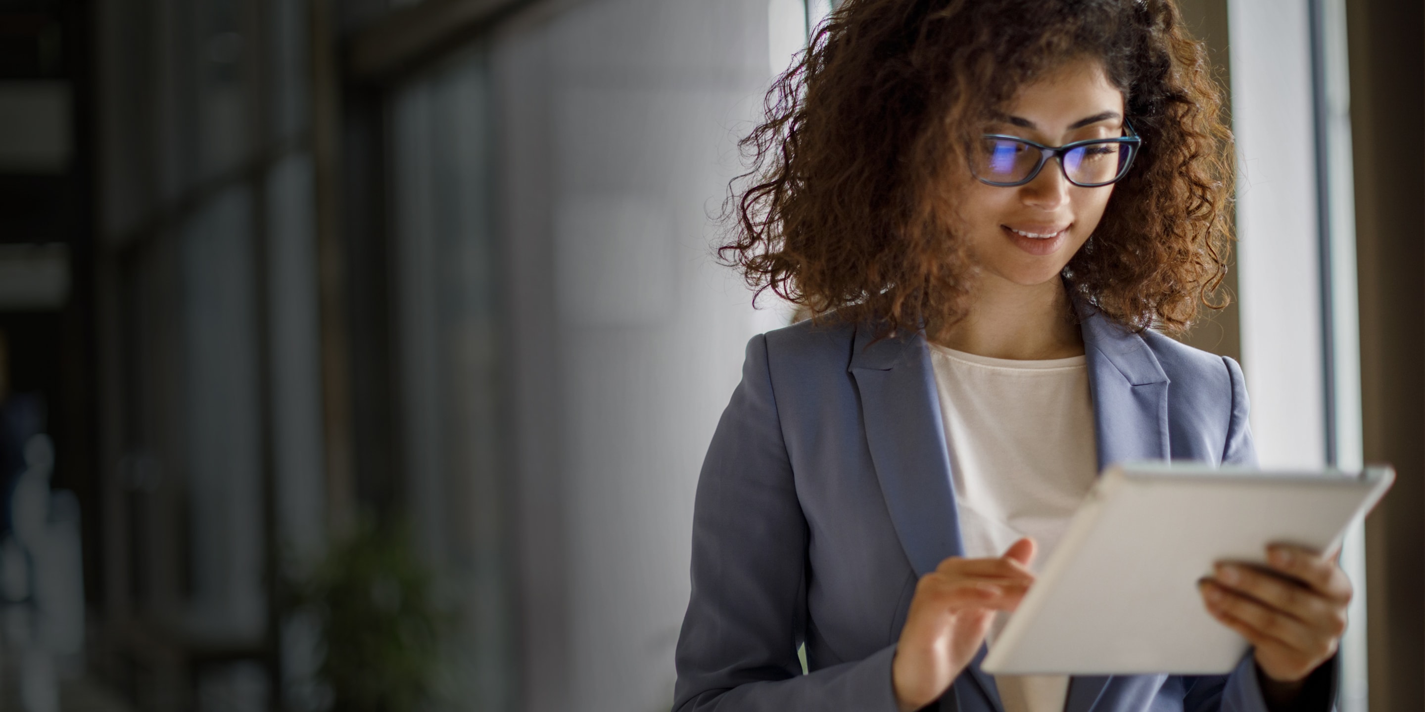 Woman looking at tablet
